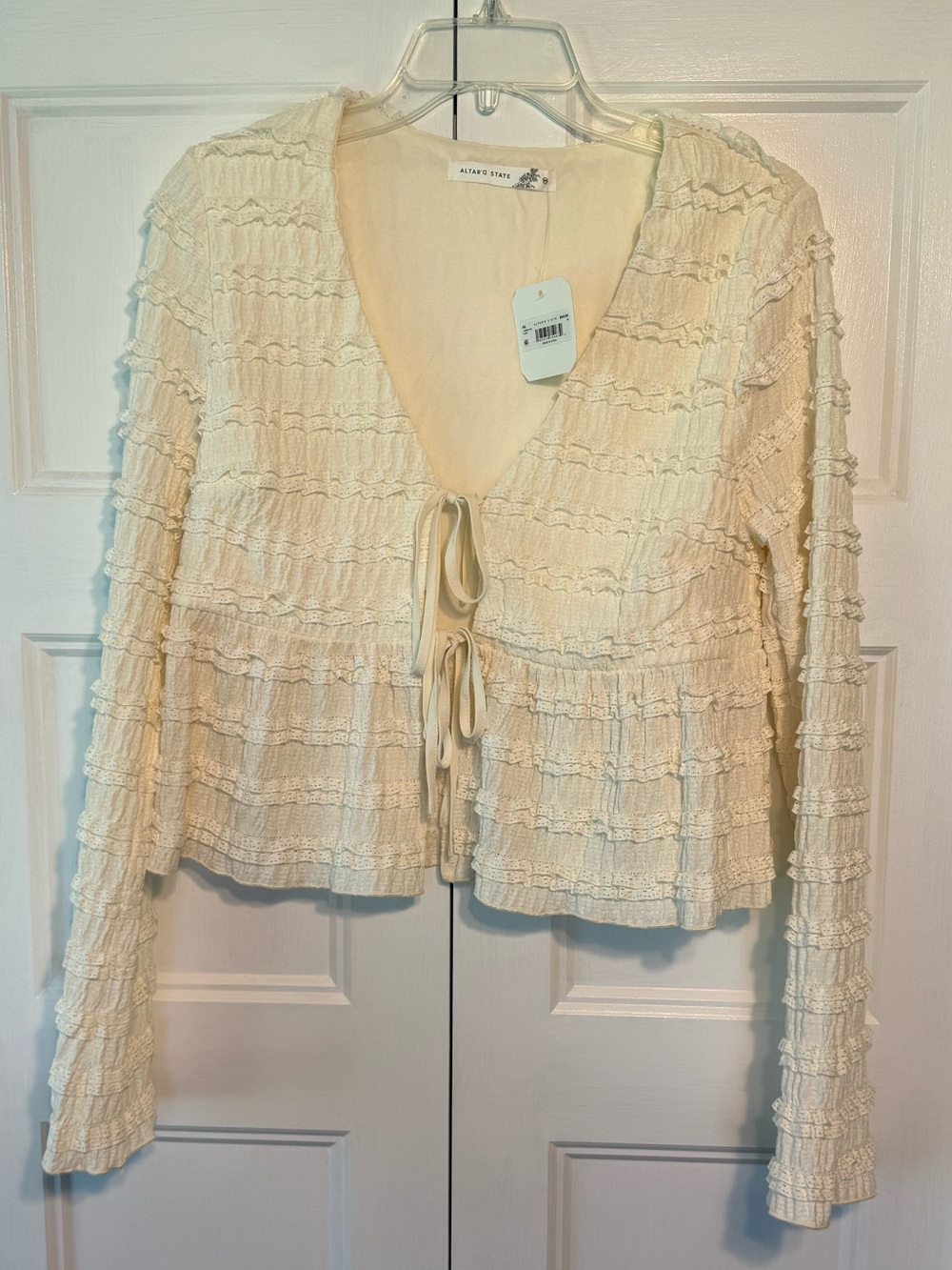 Altar’d State ivory ruffle cardigan